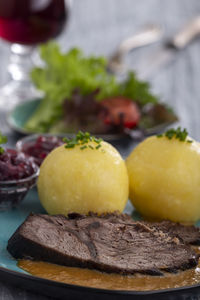 Close-up of fruits in plate on table