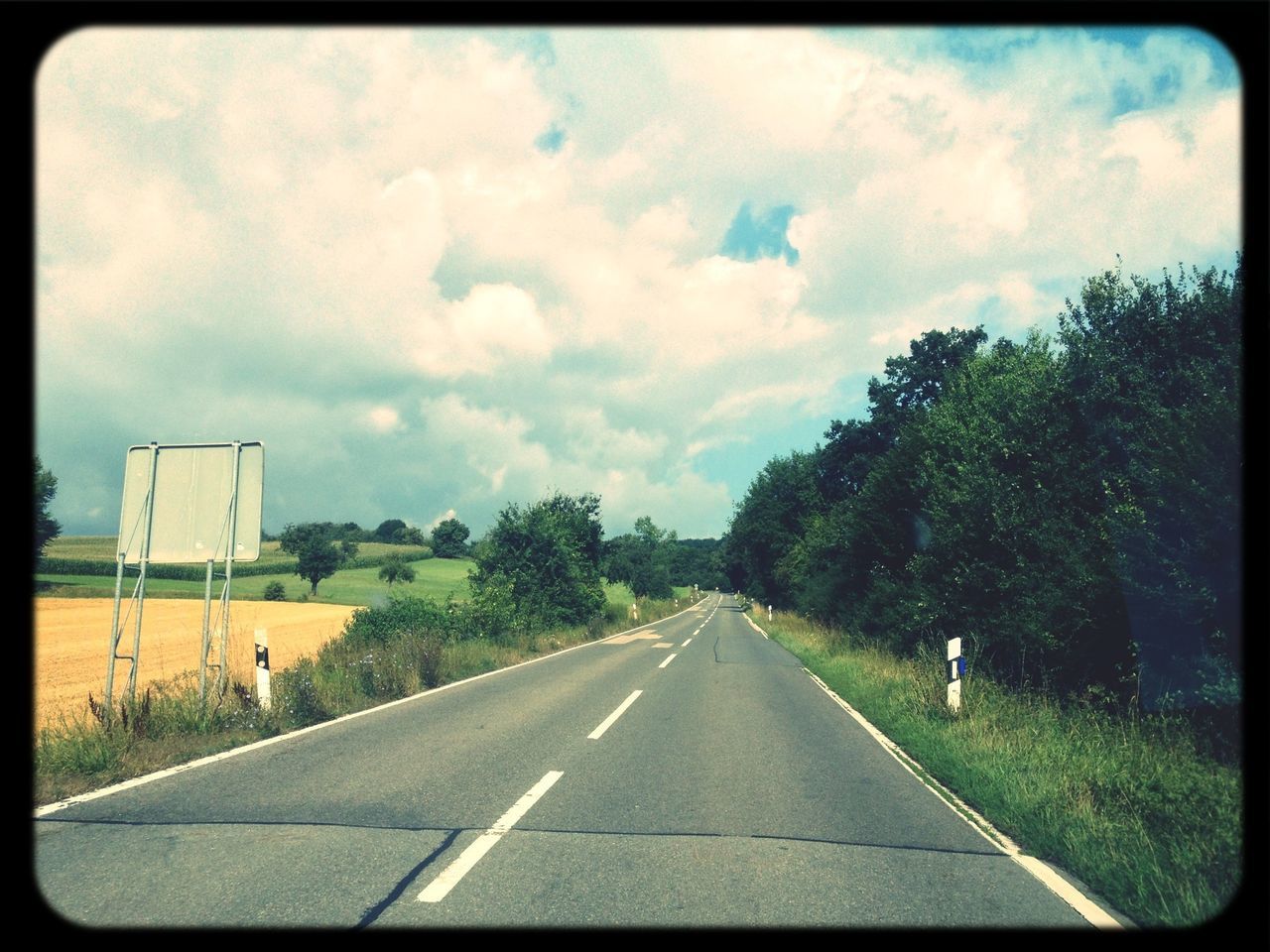 the way forward, road, transportation, road marking, sky, diminishing perspective, vanishing point, cloud - sky, transfer print, tree, cloudy, street, country road, cloud, auto post production filter, empty road, empty, car, asphalt, outdoors