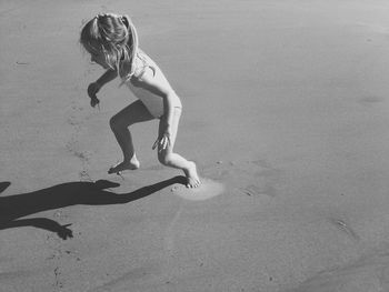 Boy playing on beach