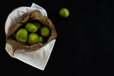 High angle view of fruits in plate on table