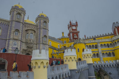 Low angle view of temple against building