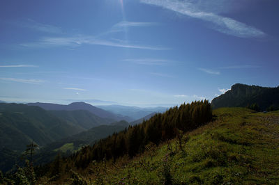 Scenic view of mountains against sky at night