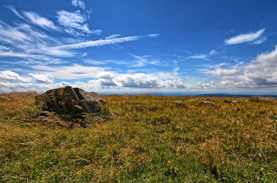 Scenic view of land against sky