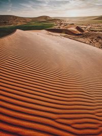 Scenic view of desert against sky