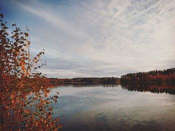 Scenic view of lake against sky during autumn