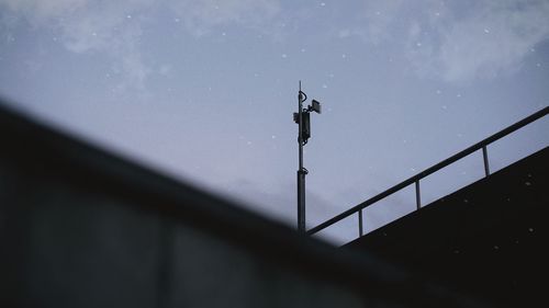 Low angle view of bridge against sky during rainy season