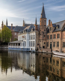 View of medieval buildings at the sunset in bruges, flanders, belgium