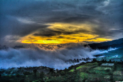 Scenic view of dramatic sky during sunset