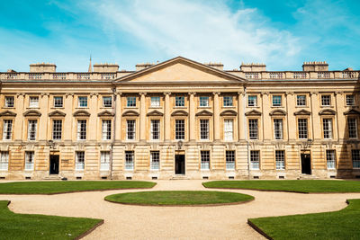 Facade of historic building against sky