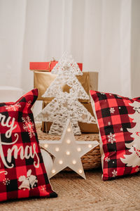 Close up of beautiful christmas decoration at home, christmas tree, gifts and ornaments
