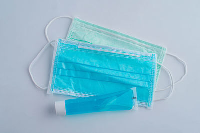 Close-up of blue colored pencils on white background