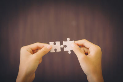 Close-up of person holding hands