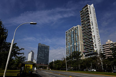 Low angle view of modern buildings against sky