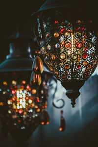 Close-up of illuminated old lamps