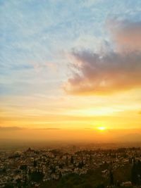 High angle view of townscape against sky during sunset