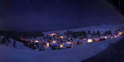 Illuminated city at night