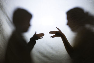 Cropped image of person against wall