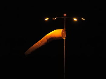 Close-up of illuminated street light