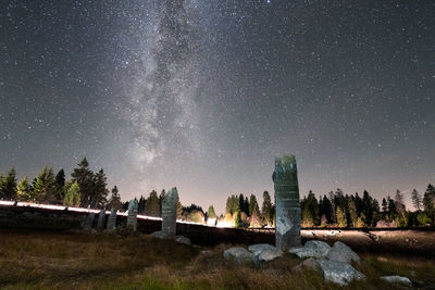 Scenic view of star field against sky at night