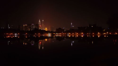 Illuminated buildings in city at night