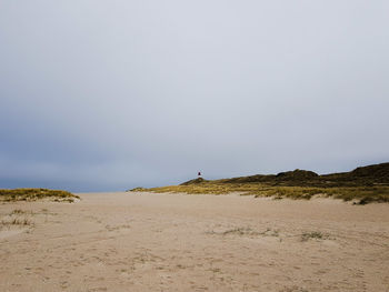 Scenic view of desert against sky