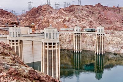 View of dam on riverbank