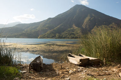 Scenic view of lake atitlan against mountain