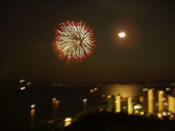 Firework display at night