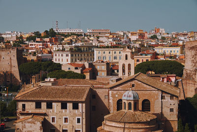 Aerial view of townscape against sky