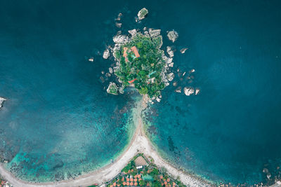 High angle view of island amidst sea