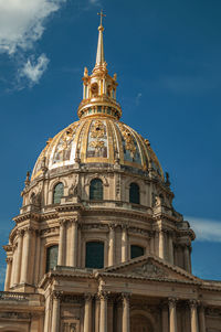 Golden dome of les invalides palace in a sunny day at paris. the famous capital of france.