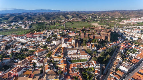 High angle shot of townscape against sky