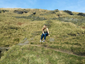 Full length of man on landscape against sky