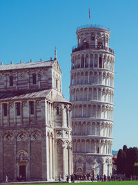 Low angle view of historical building against blue sky