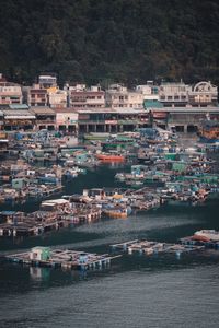 High angle view of buildings and harbor in city
