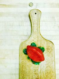 Close-up of strawberry on wood