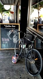 Bicycle parked in front of building