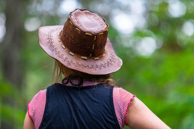 Rear view of woman wearing hat