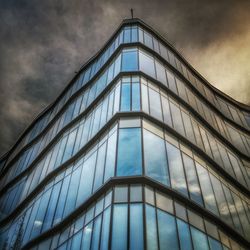 Low angle view of modern building against sky