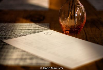 Close-up of wine glasses on table