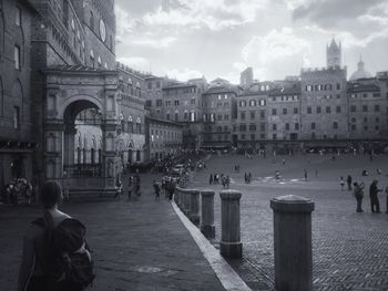 Tourists in front of historic building