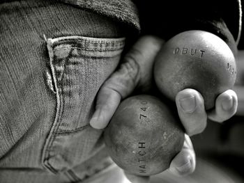 Close-up of man holding hands