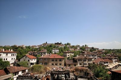 Houses against clear sky