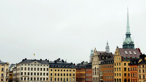 Low angle view of buildings against clear sky