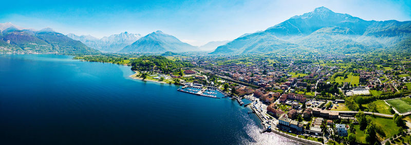 High angle view of townscape and mountains against sky