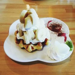 High angle view of ice cream in plate on table