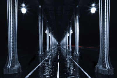 Digital composite image of illuminated bridge