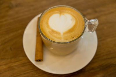 Close-up of coffee cup on table