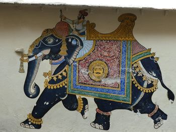 Close-up of painting on wall