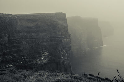 Scenic view of rock formations against sky